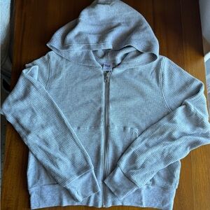 Aritzia’s TNA Light Gray Waffle Knit Zip-Up Hoodie